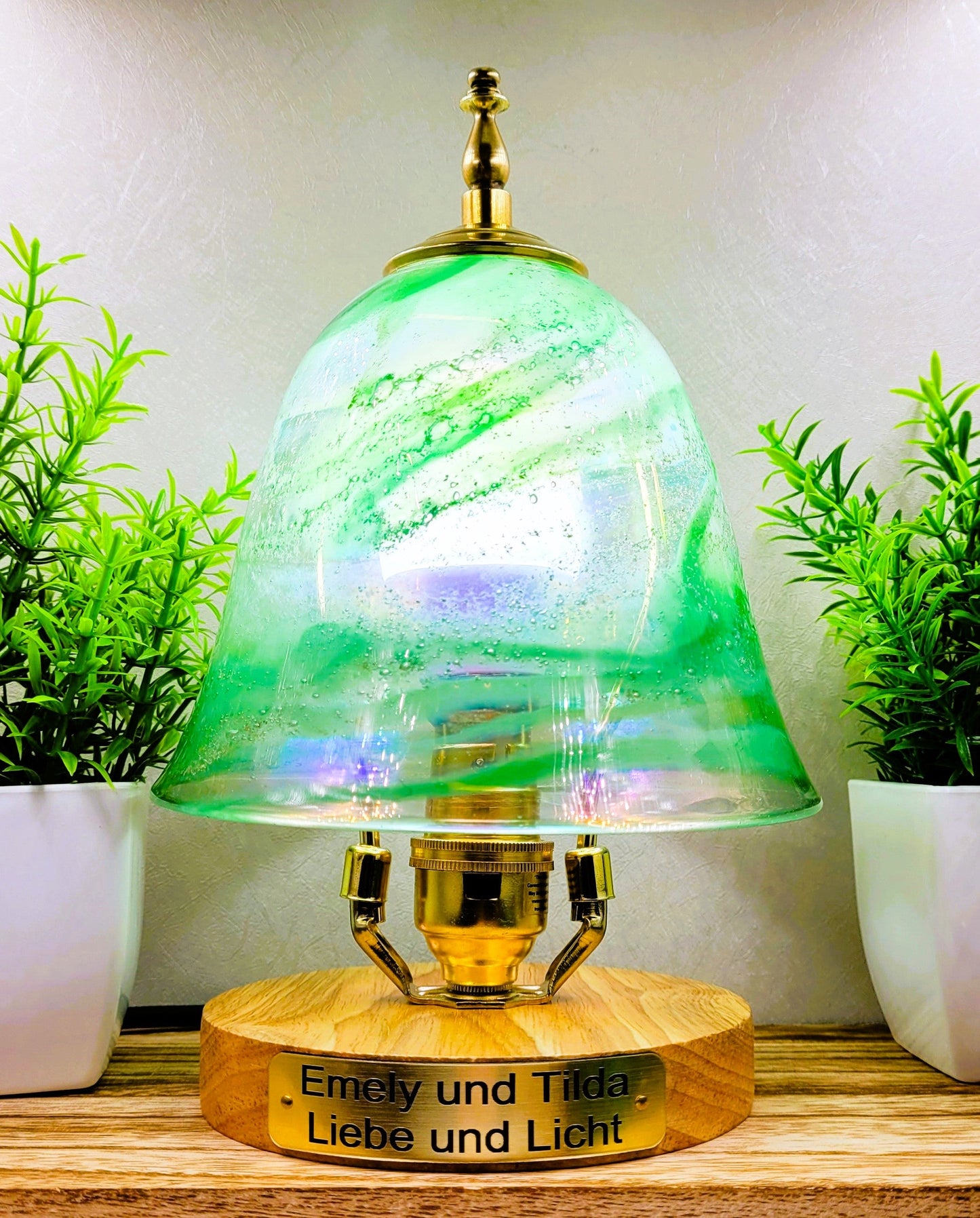 Ashes in glass table lamp