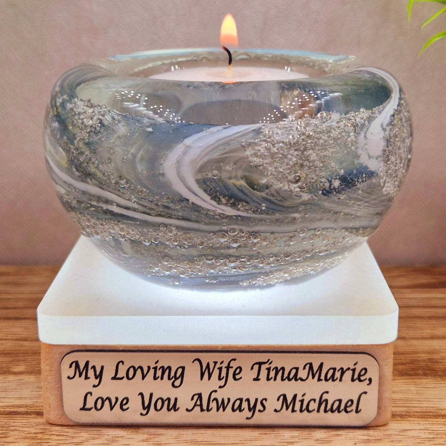 Ashes in glass memorial tealight