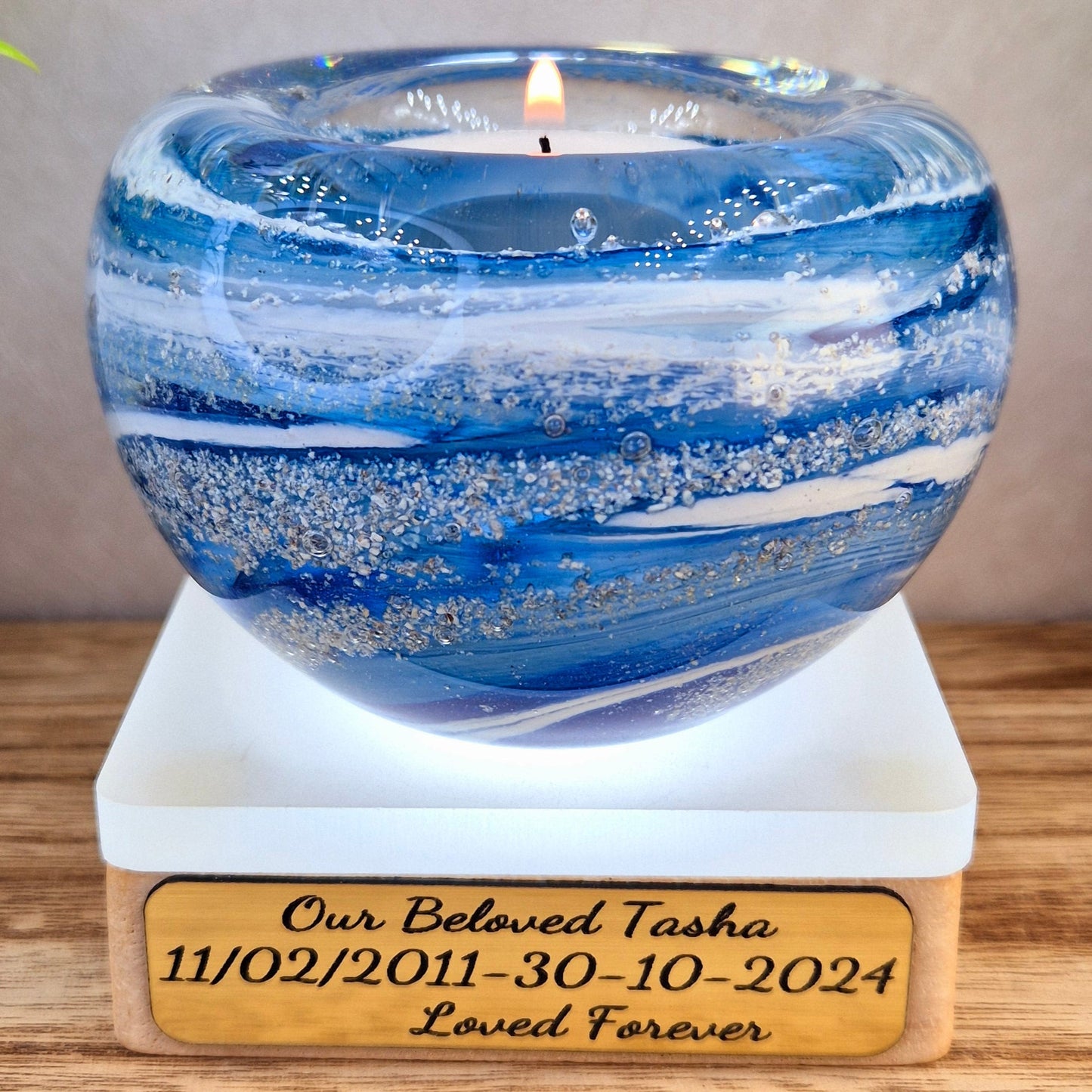 Ashes in glass memorial tealight