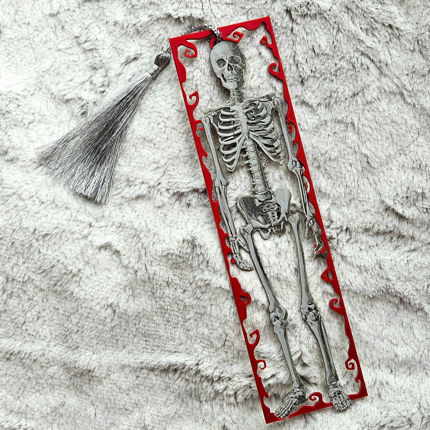 Framed Skeleton – Gothic Skeleton Bookmark with Red Swirl Frame