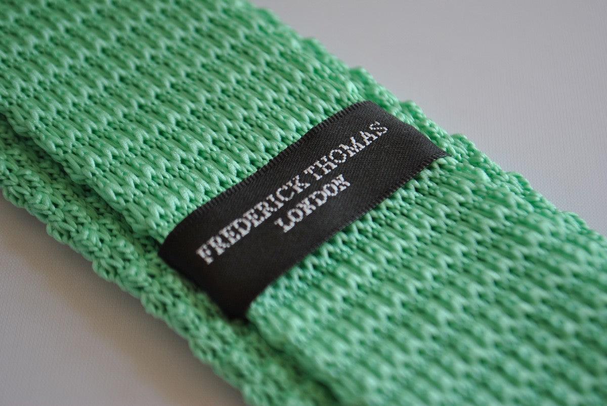 mint green skinny knitted tie with white tip