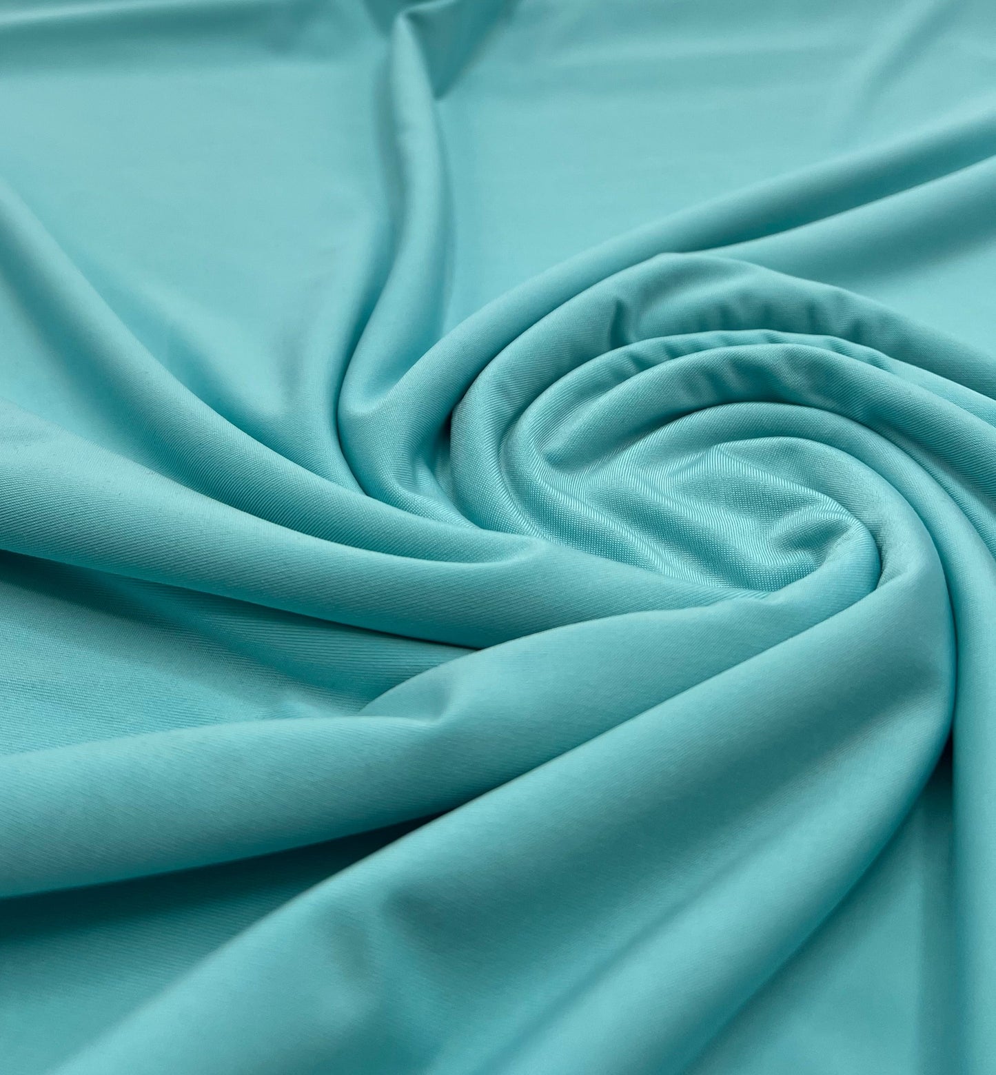 Aqua Blue Plain Shiny Soft Touch Slinky 4 Way Stretch Fabric