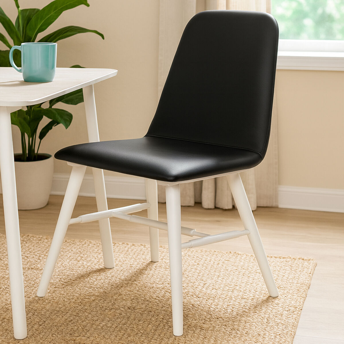 Cassy Black Leather Effect Dining Chair With White Legs