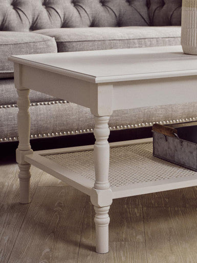 White Wooden Coffee Table with Cane Webbed Lower Shelf and Carved Spindle Legs, Heritage