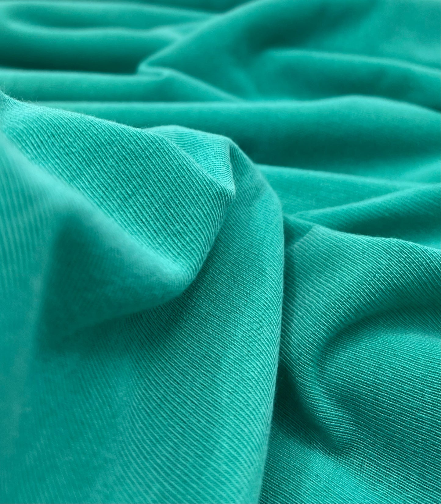 Jade Green Lightweight Melange Knit Stretch Fabric