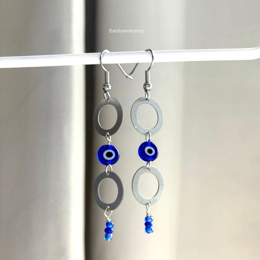 Stainless steel circle and blue evil eye bead statement dangle earrings