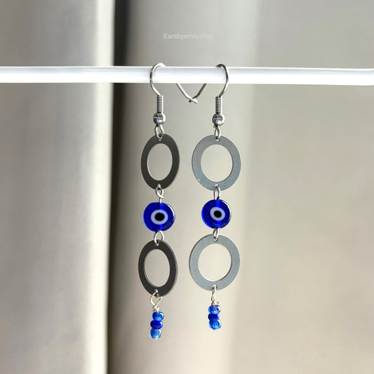 Stainless steel circle and blue evil eye bead statement dangle earrings