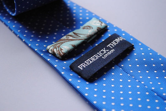 electric blue tie with white pin dots