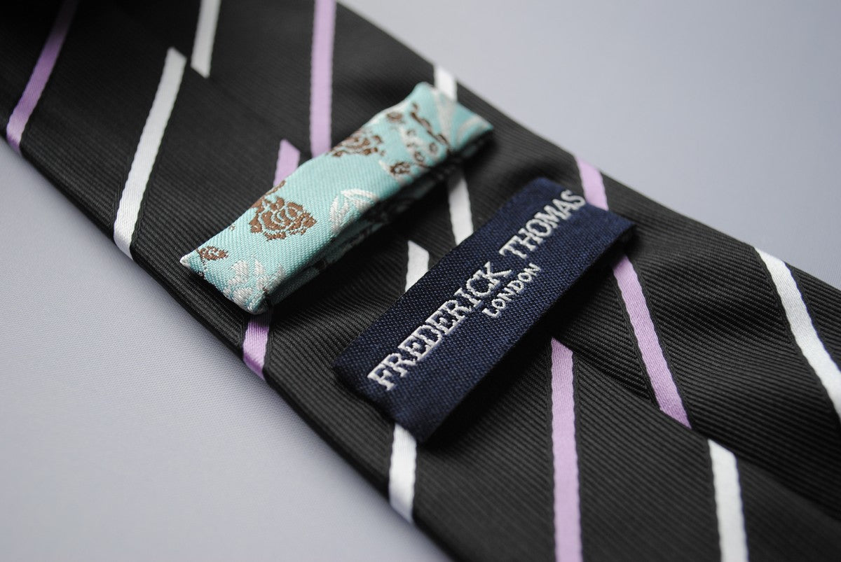 black tie with  thin purple and white stripes