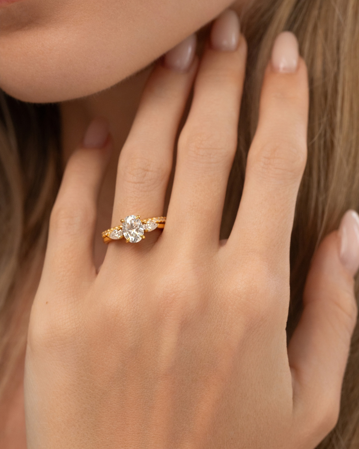 2 ct Oval Moissanite Three Stone Engagement Ring in 18k Gold Vermeil