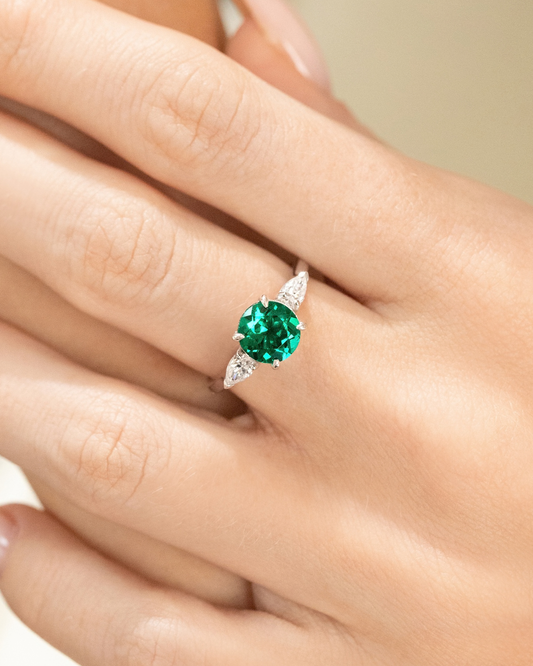 Emerald Round Cut Three Stone Engagement Ring in Sterling Silver