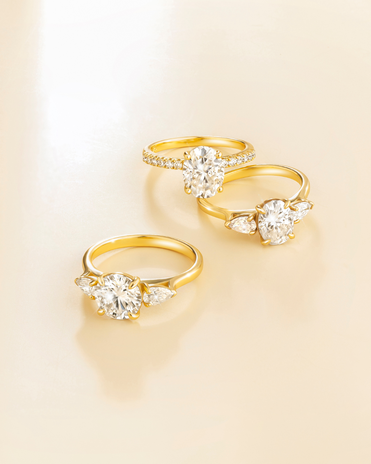 2 ct Oval Moissanite Three Stone Engagement Ring in 18k Gold Vermeil
