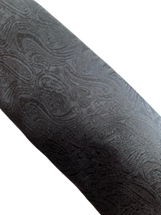 black tie with subtle paisley design