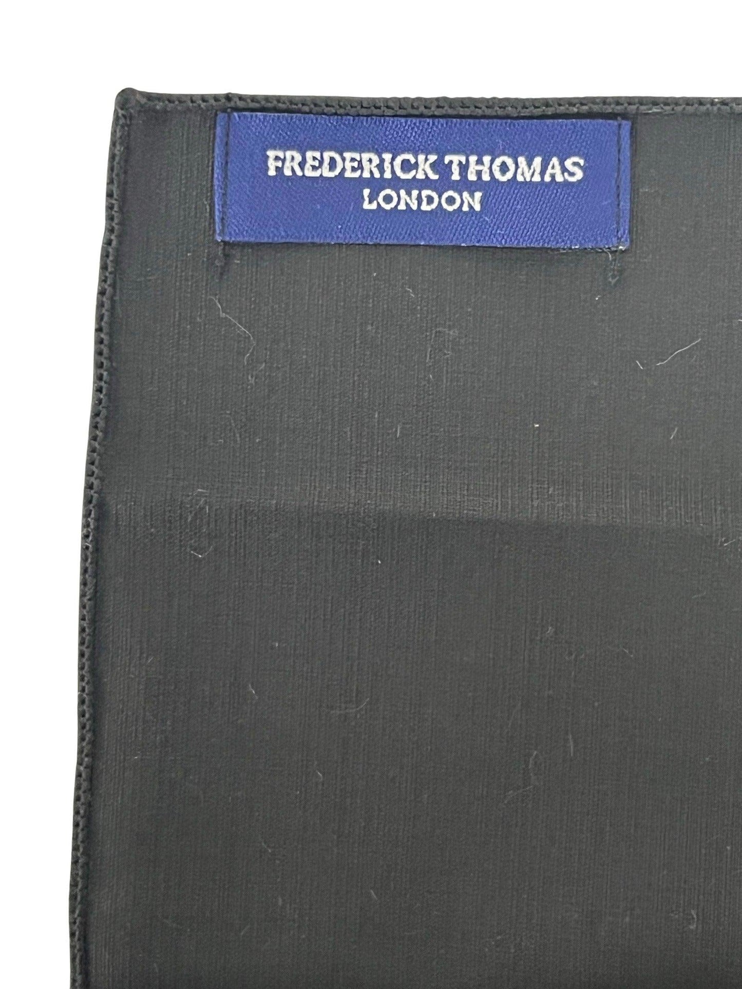 Matching plain black bamboo tie and pocket square