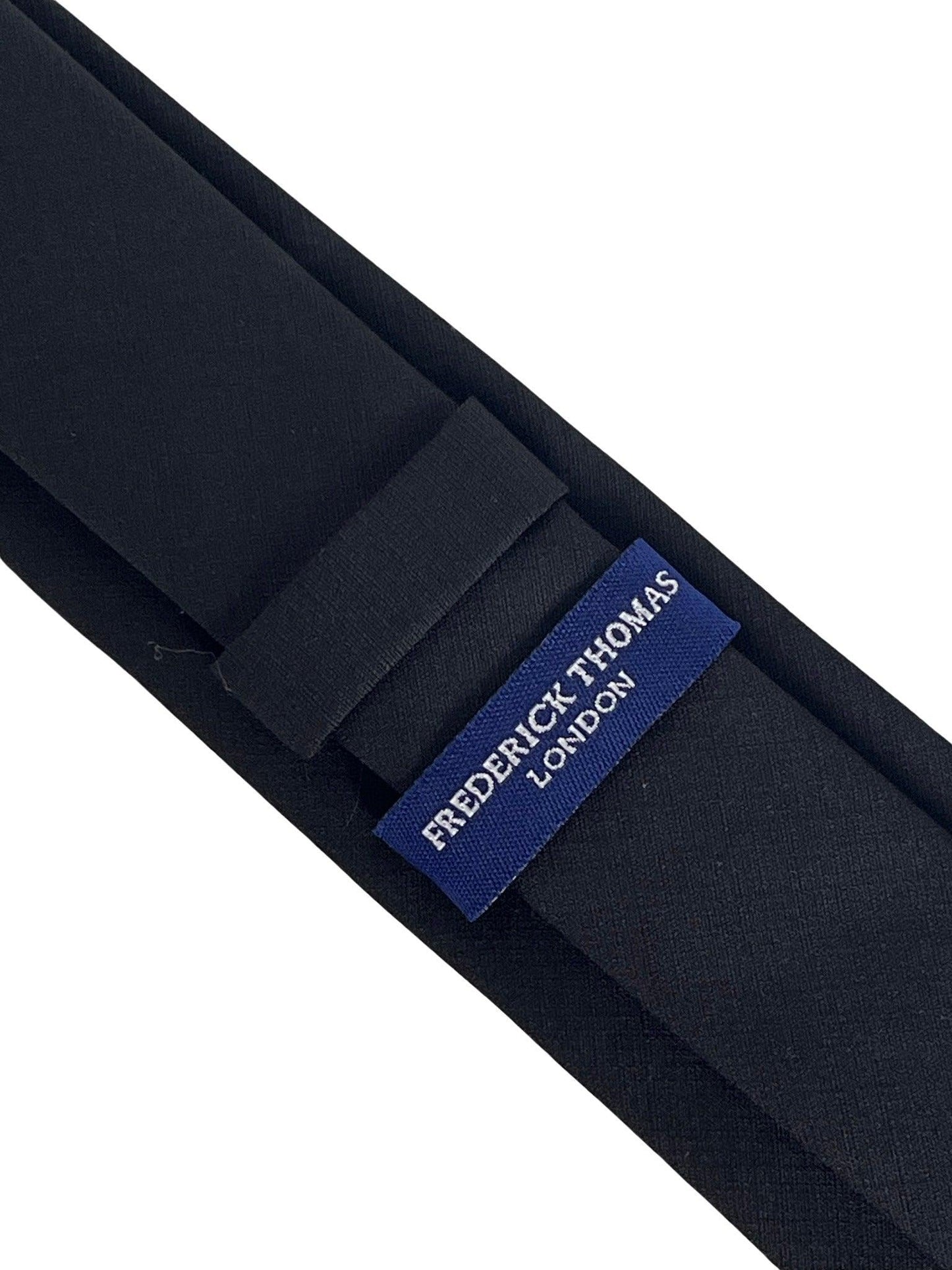 Matching plain black bamboo tie and pocket square
