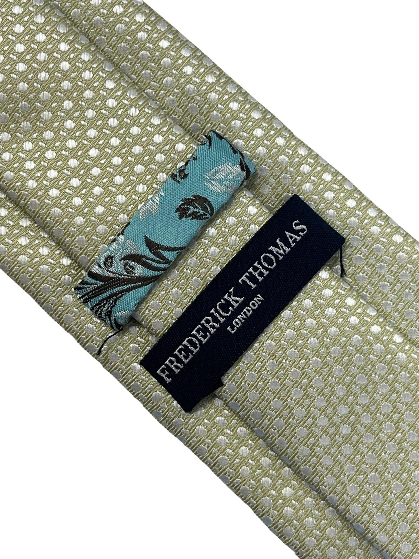 Gold tie with  geometric design