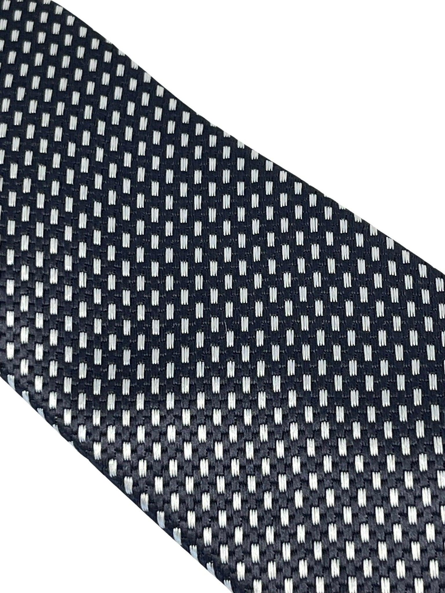 dark grey and white geometric stitch design