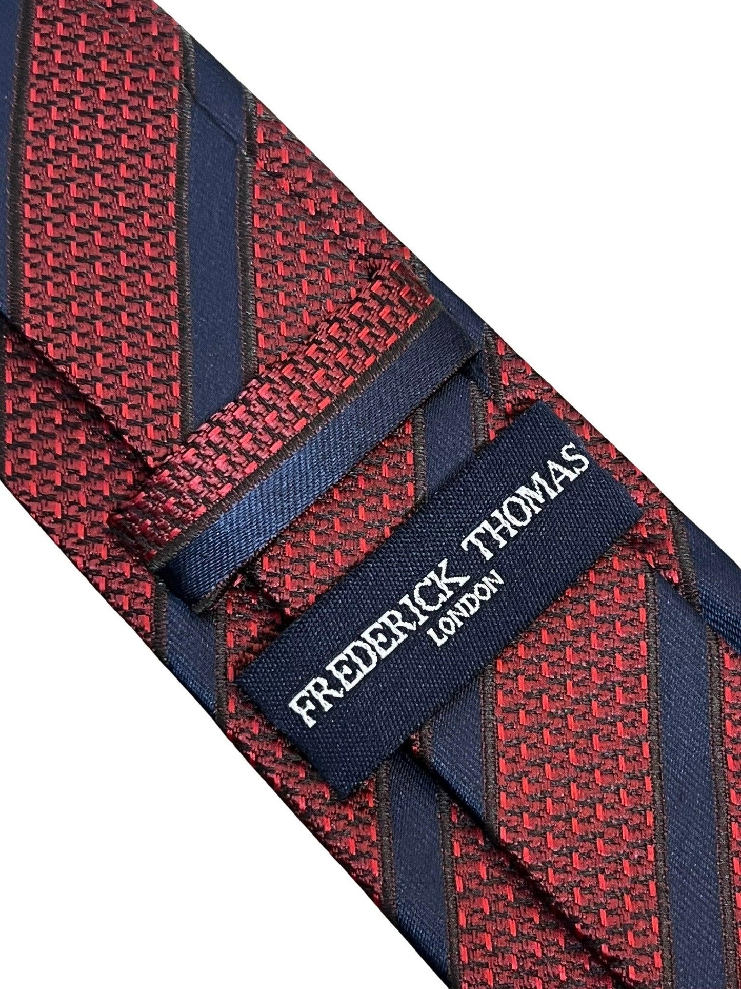 maroon red tie with snakeskin style and black stripes