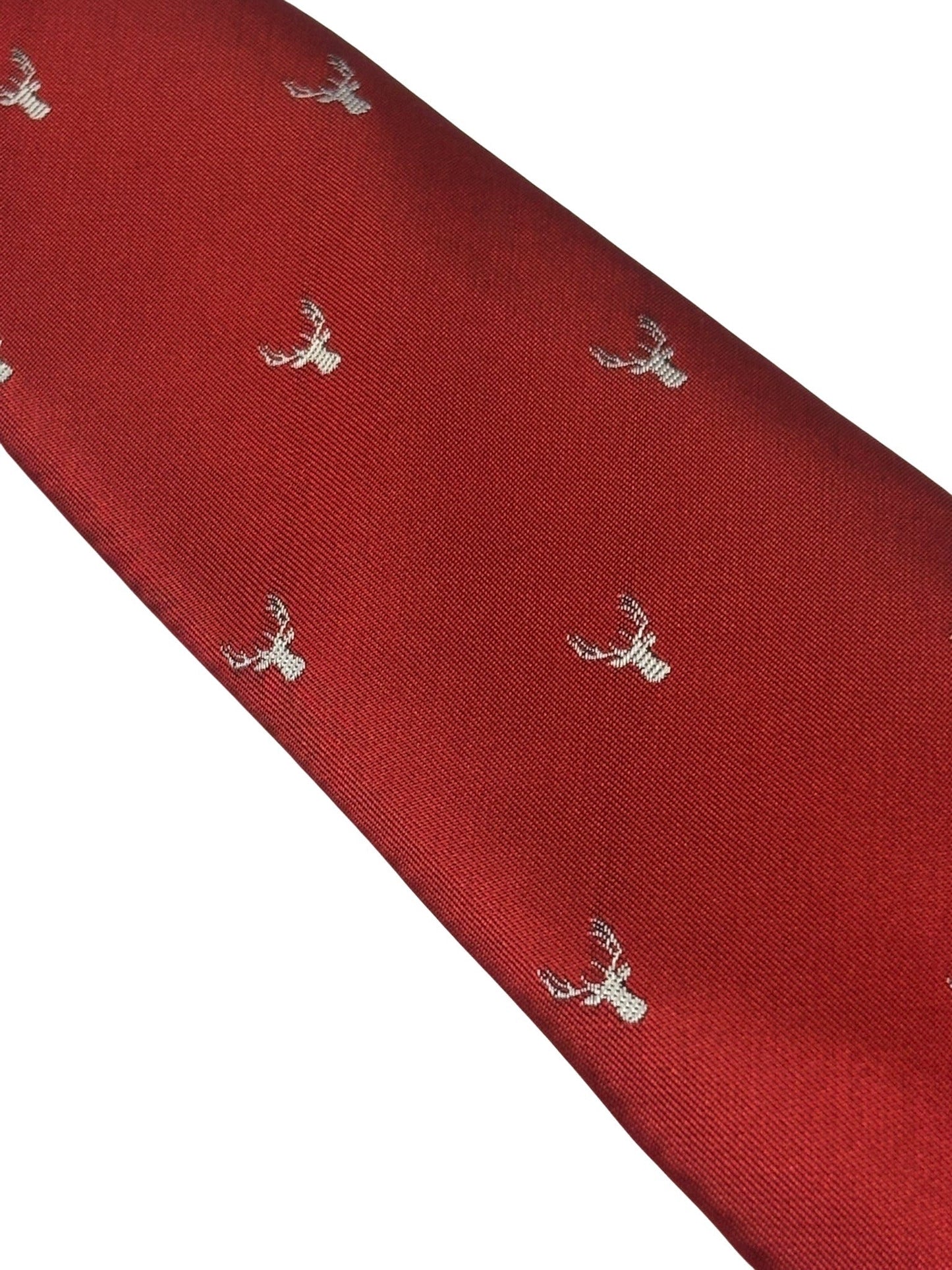 dark red tie with an embroidered deer head design