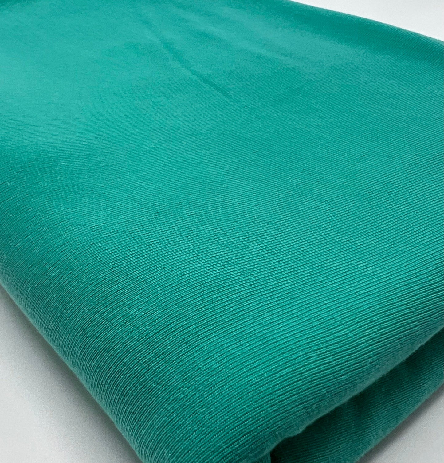 Jade Green Lightweight Melange Knit Stretch Fabric