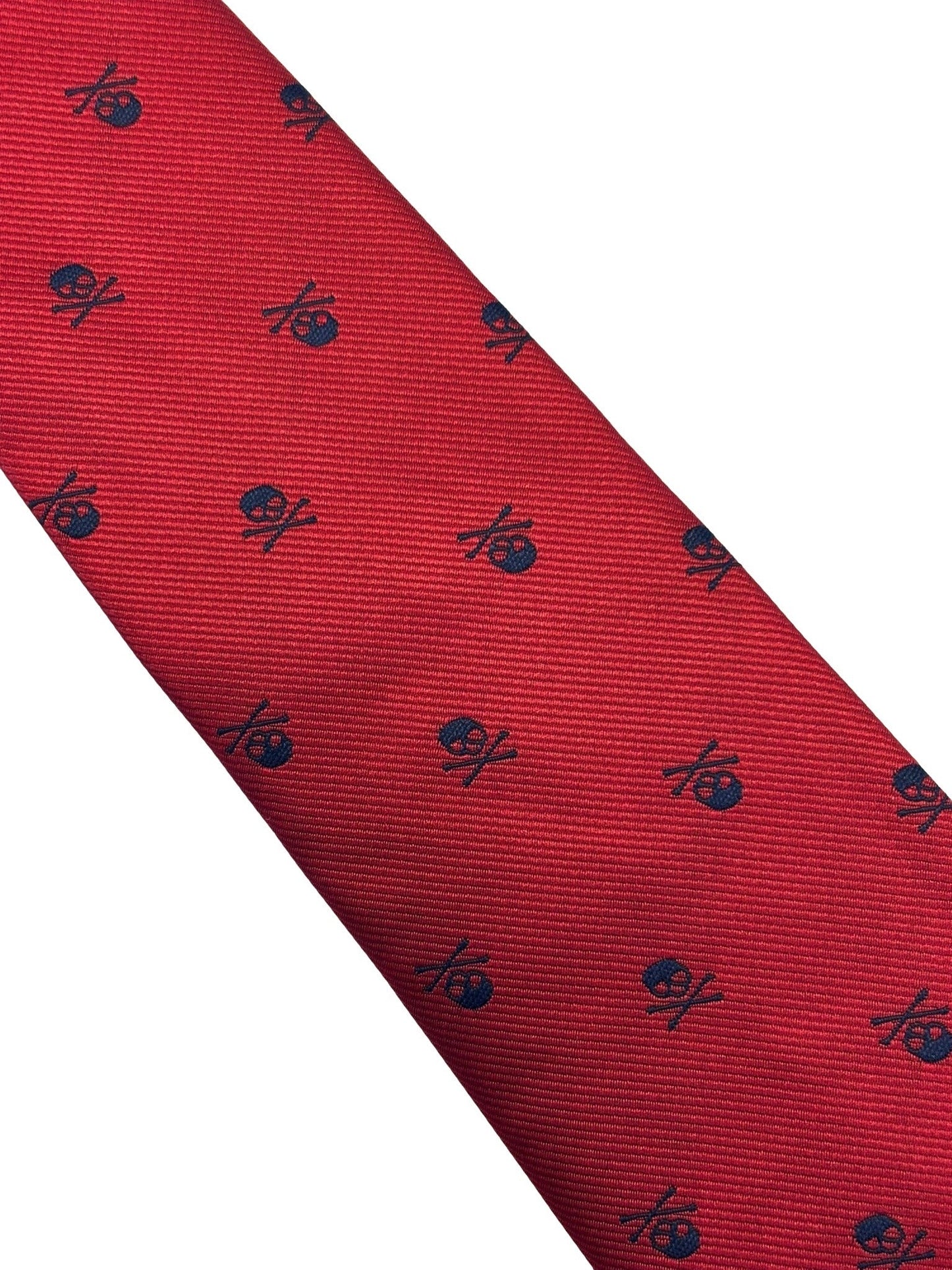 dark red tie with navy blue skull and crossbone design