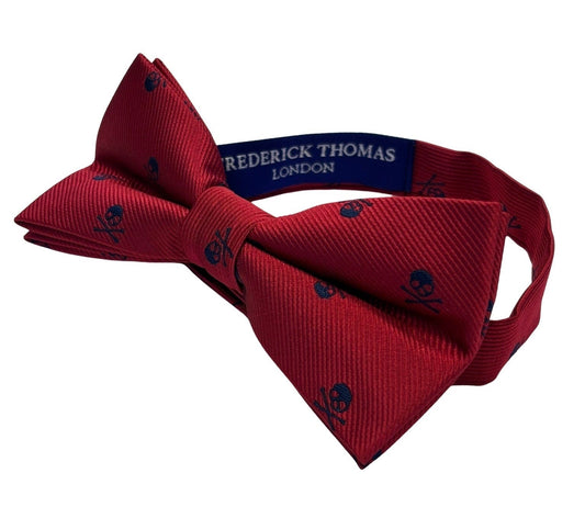 matching dark red bow tie and pocket square with navy blue skull and crossbone design