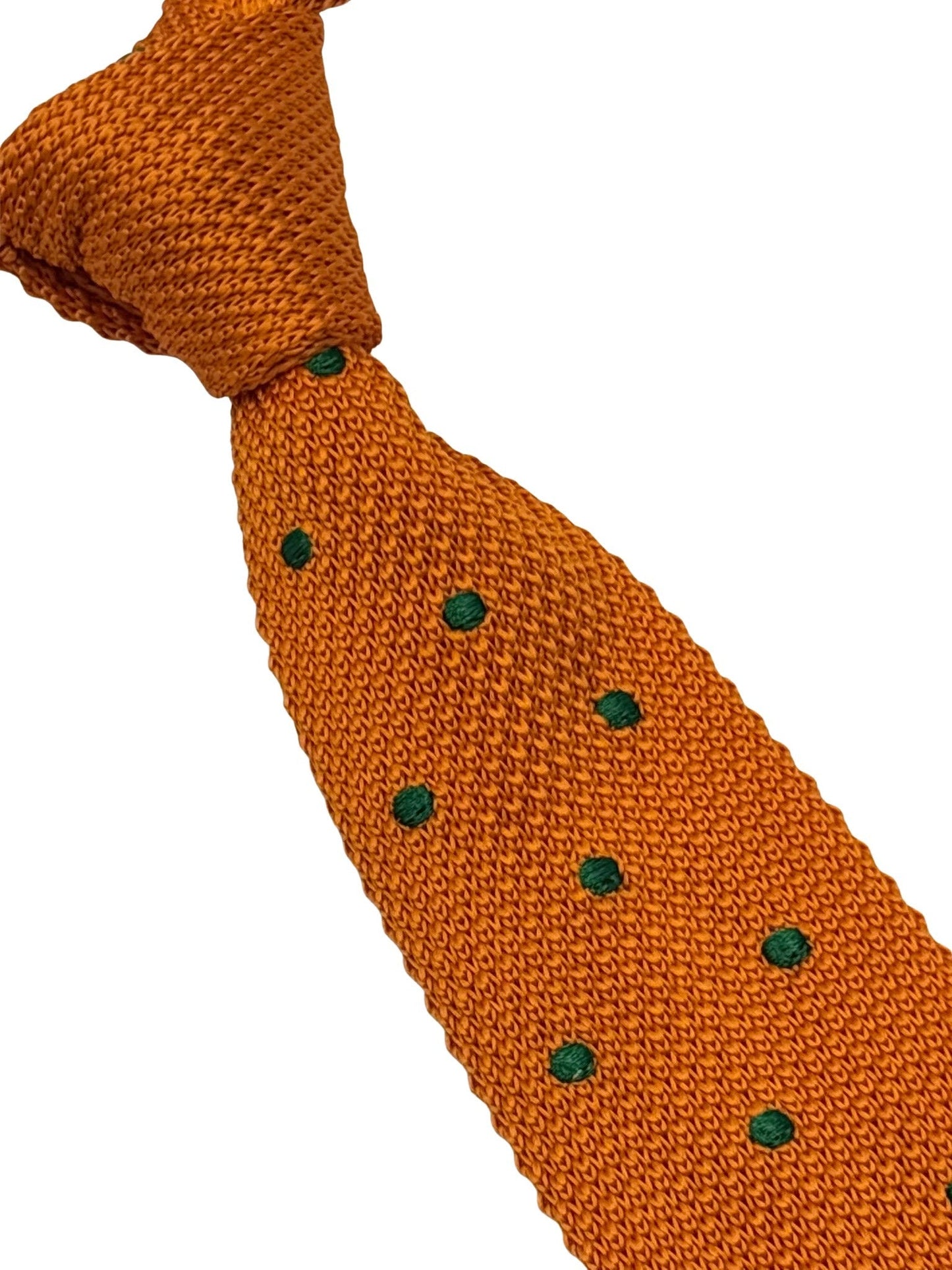 knitted tie in  bright orange with emerald green polka dots