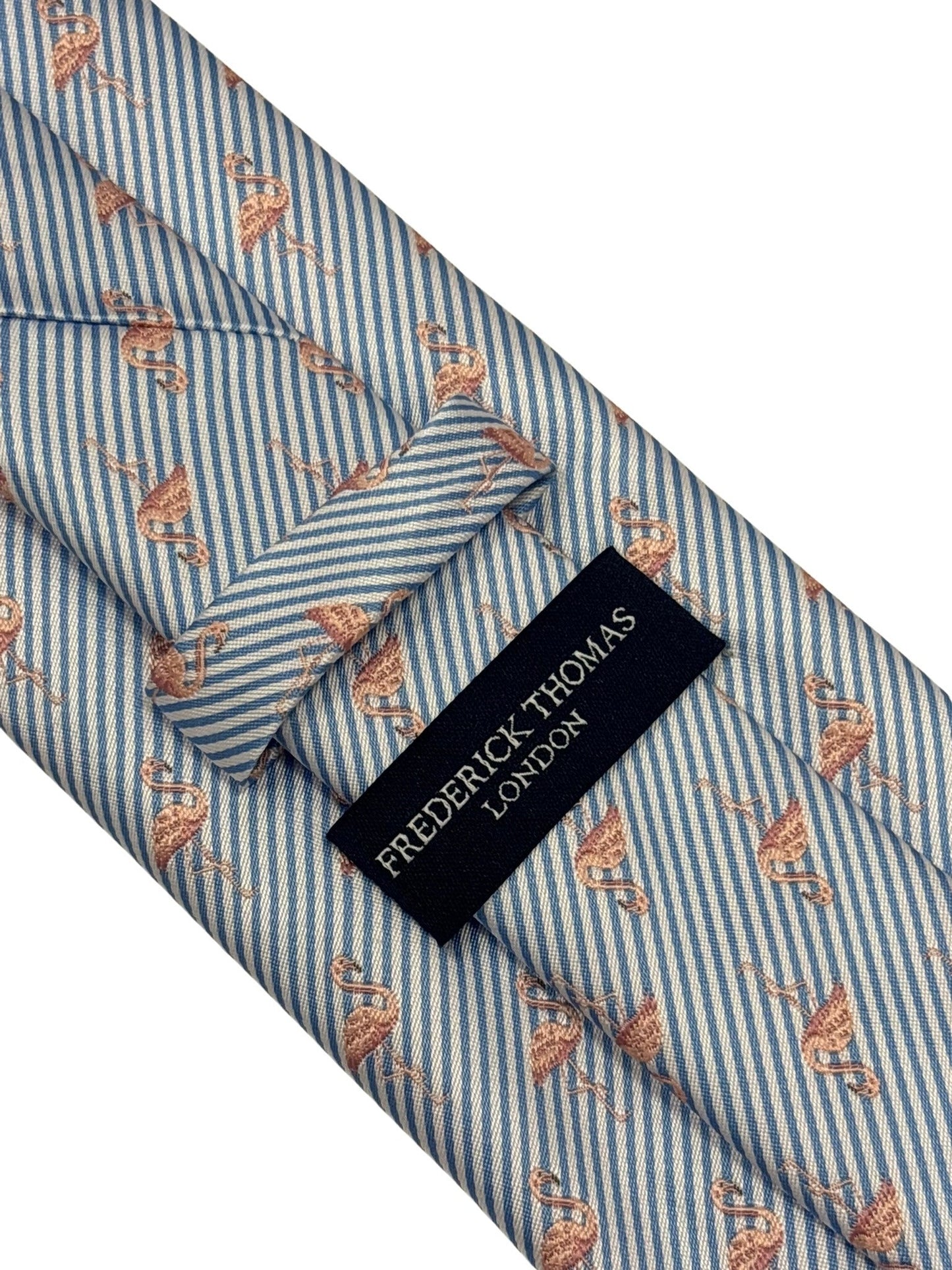 light blue and white pin striped tie with pink flamingo design