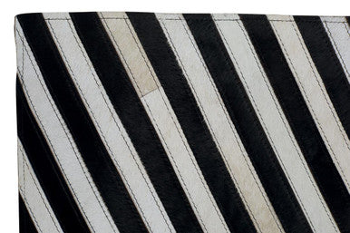 Bosie Small Black and White Hair on Leather Rug | Safira