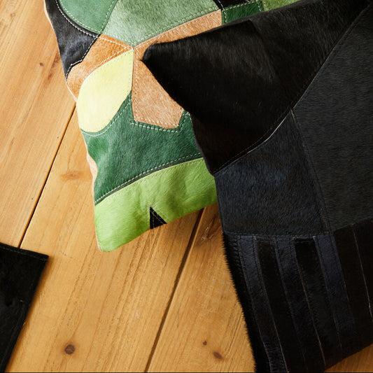 Bosie Safira Black And Grey Hair on Leather Cushion