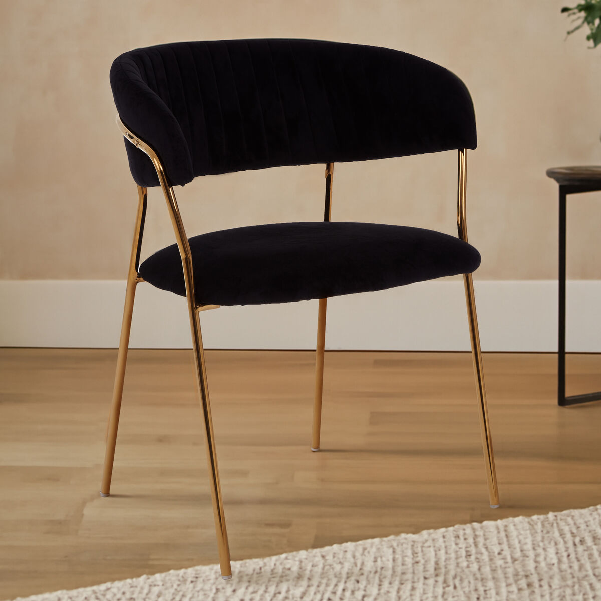 Tamzin Black Velvet Channel Tufted Dining Chair with Gold Finish Legs