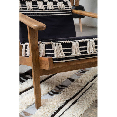 Cefena Black and White Shaggy Fabric Lounge Chair with Mango Wood Frame