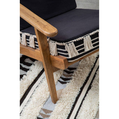 Cefena Black and White Shaggy Fabric Lounge Chair with Mango Wood Frame