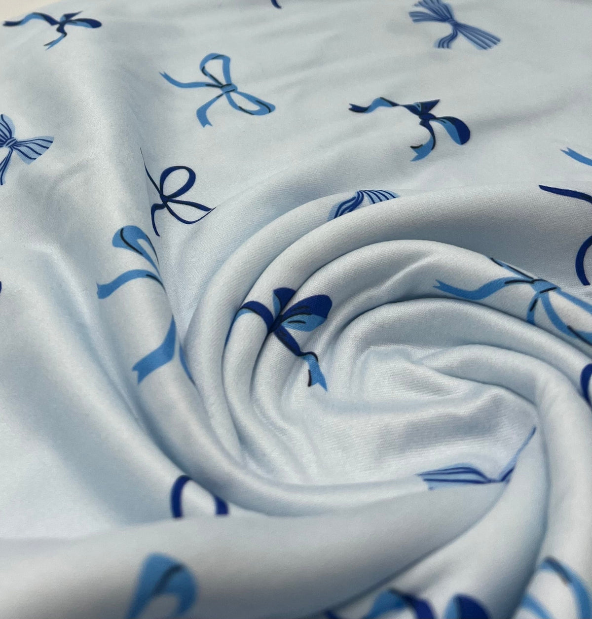 Baby Blue Bow Super Soft Print Spun Poly Stretch Fabric