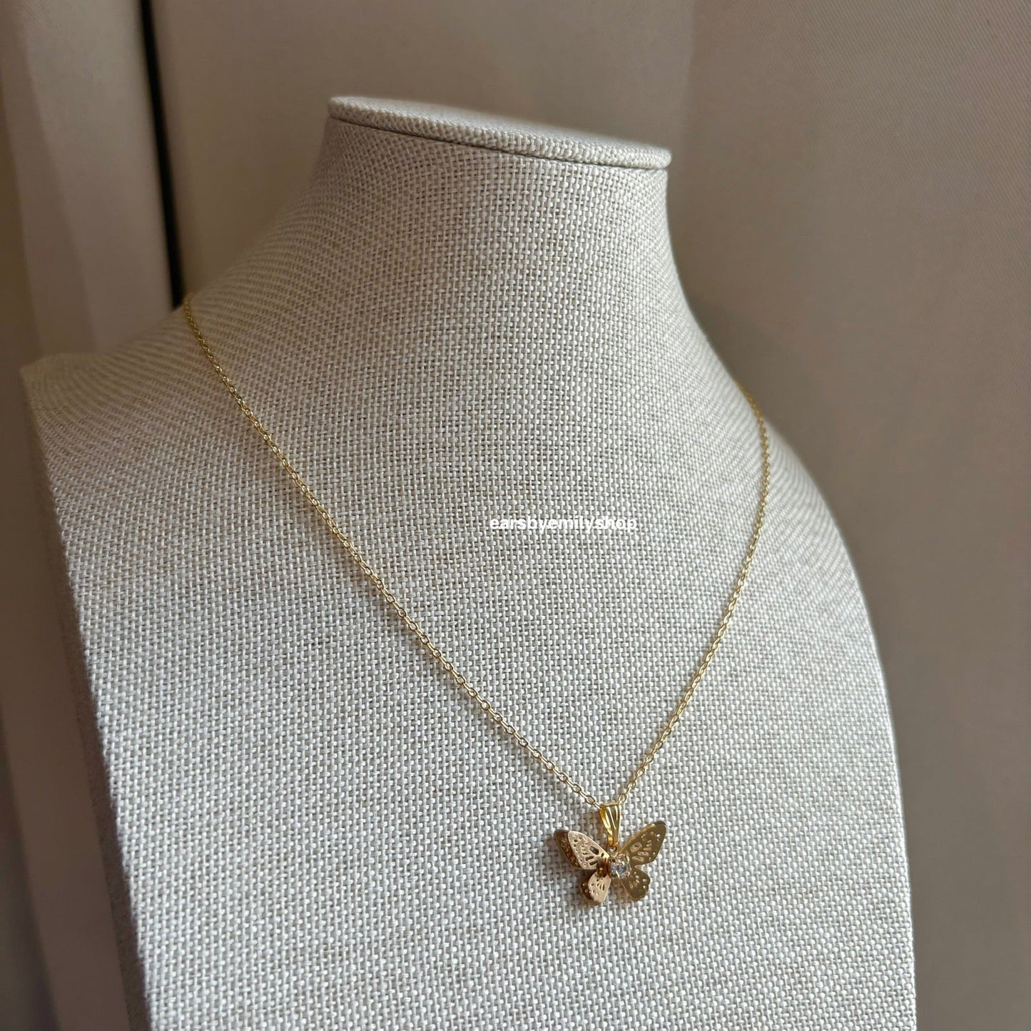 18k gold plated butterfly necklace featuring diamanté design