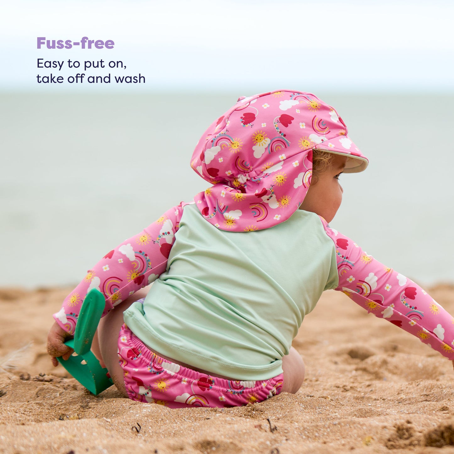 UPF 40+ Reversible Swim Hat for Babies and Toddlers in Happy Days