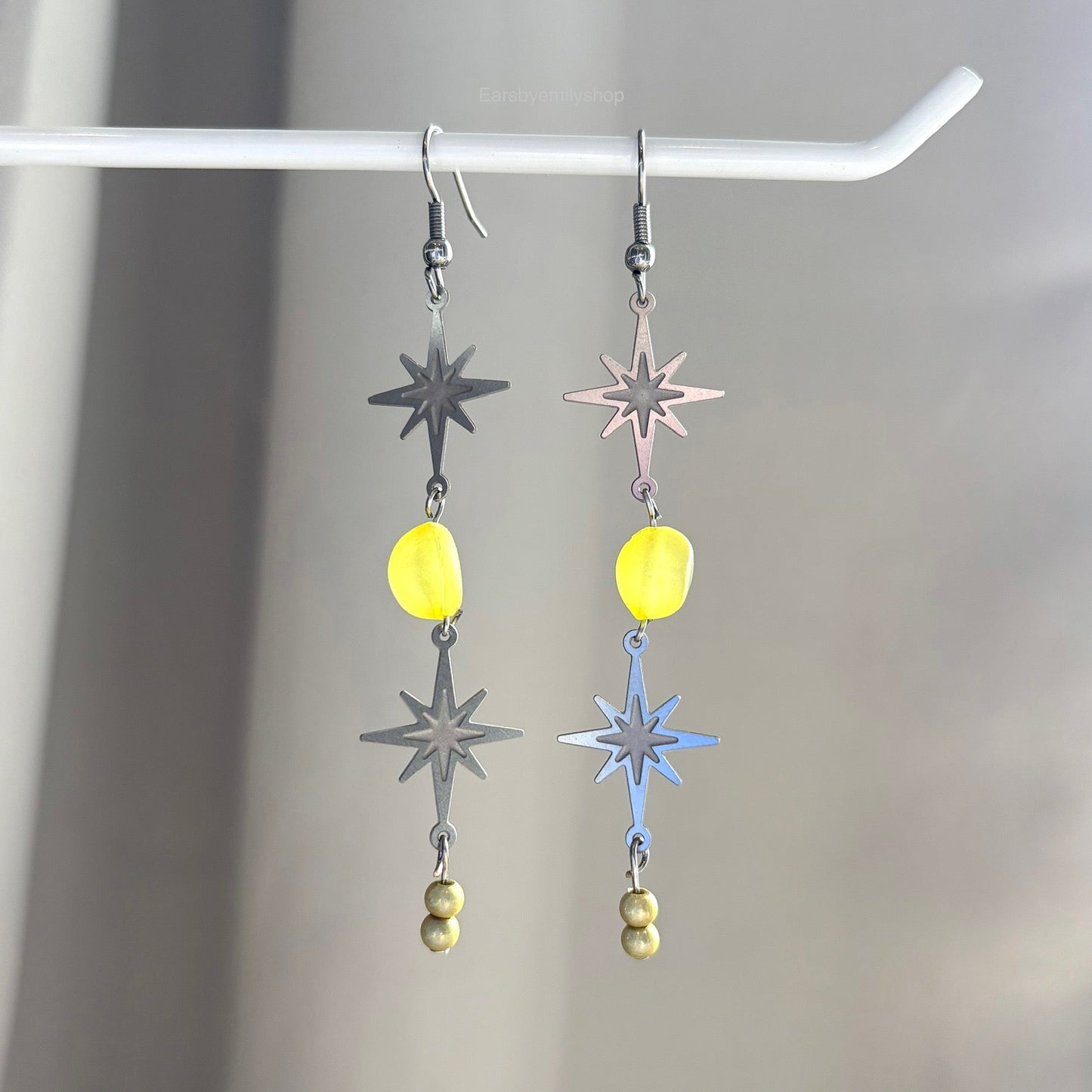 Stainless steel star and yellow bead statement dangle earrings