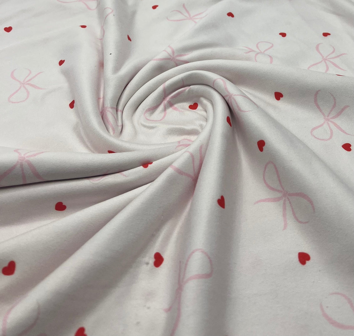 Soft Pink Heart Bow Super Soft Print Spun Poly Stretch Fabric