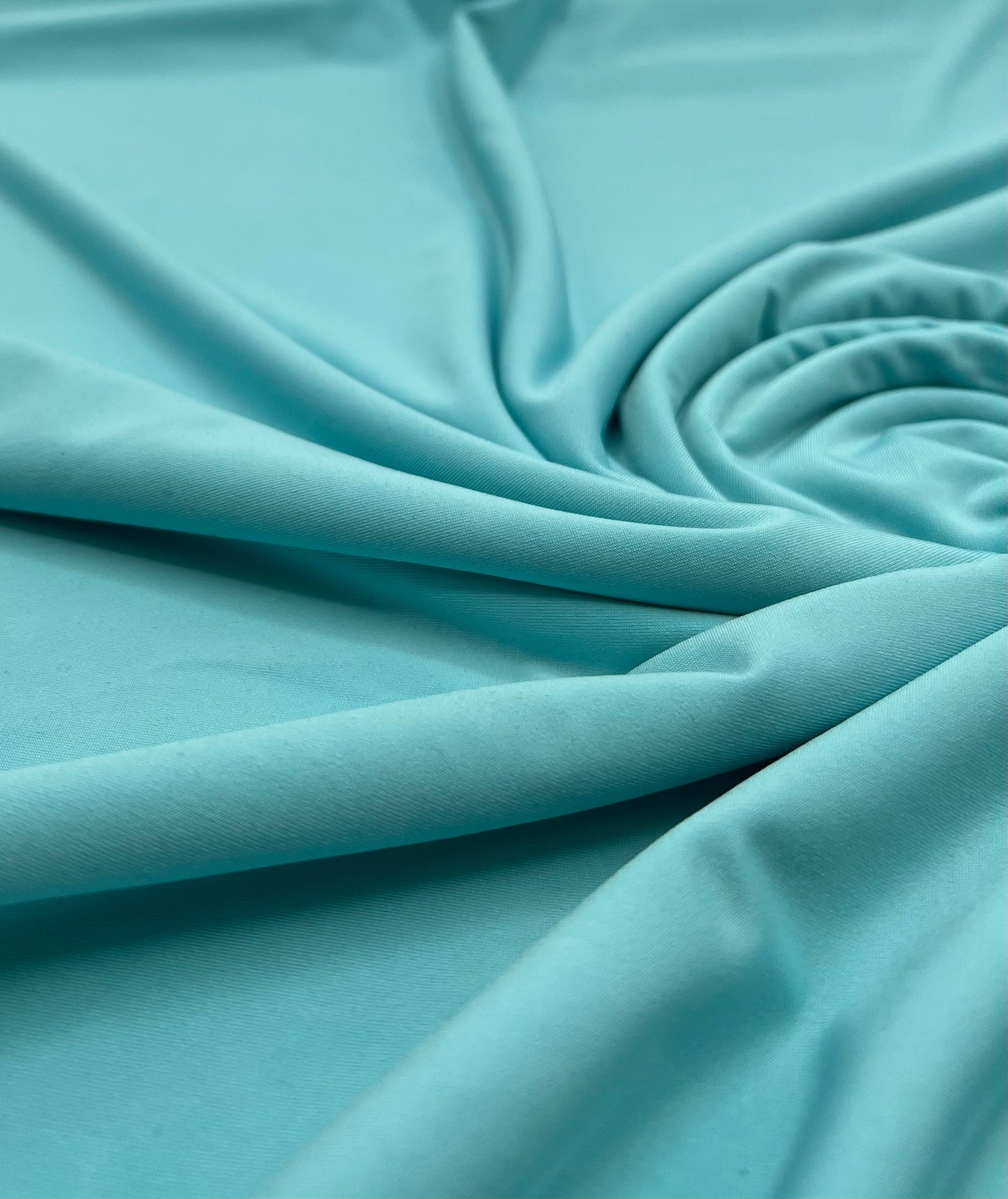 Aqua Blue Plain Shiny Soft Touch Slinky 4 Way Stretch Fabric