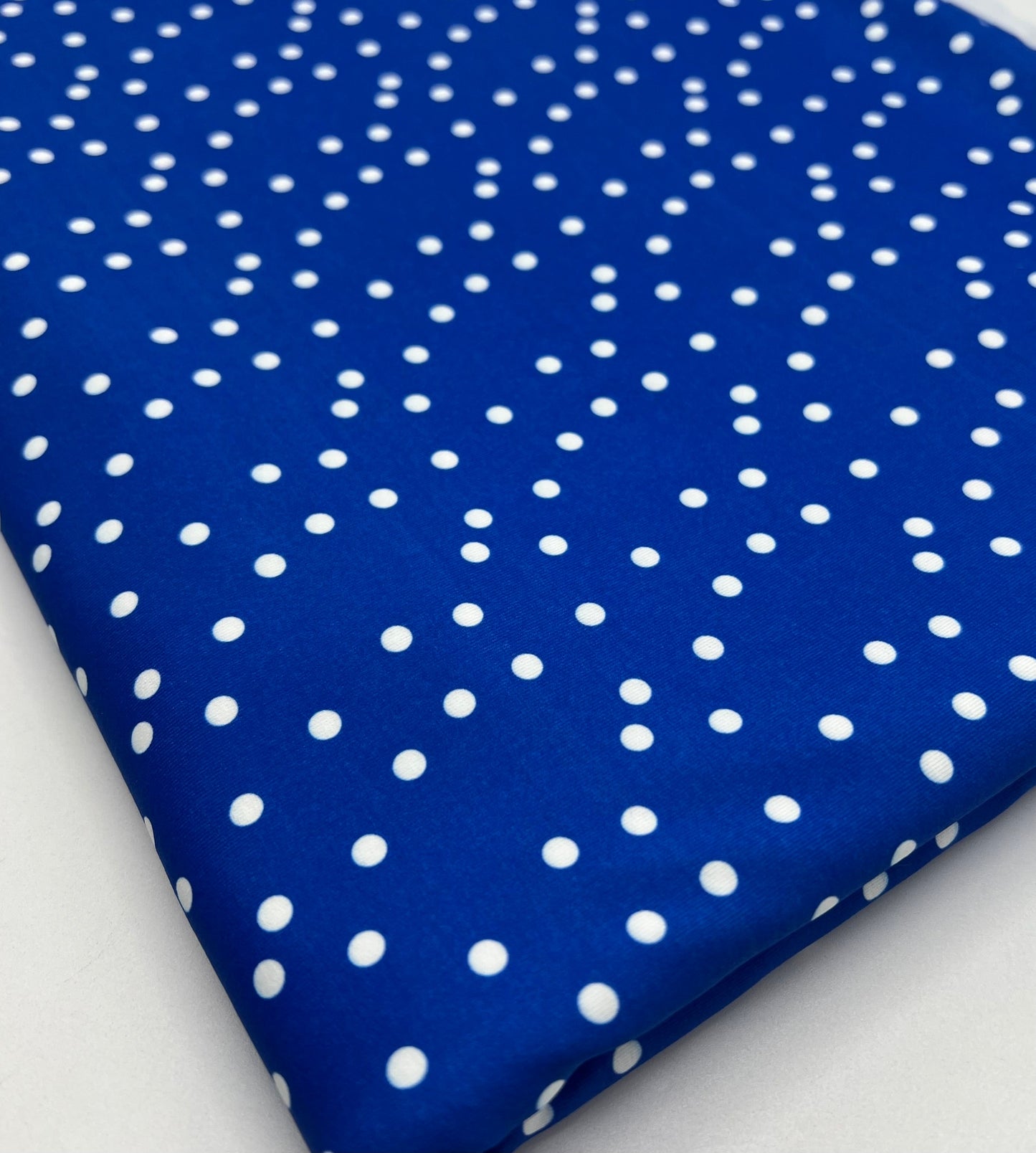 Blue Polka Stretch Jersey 220GSM 4 Way Stretch Fabric