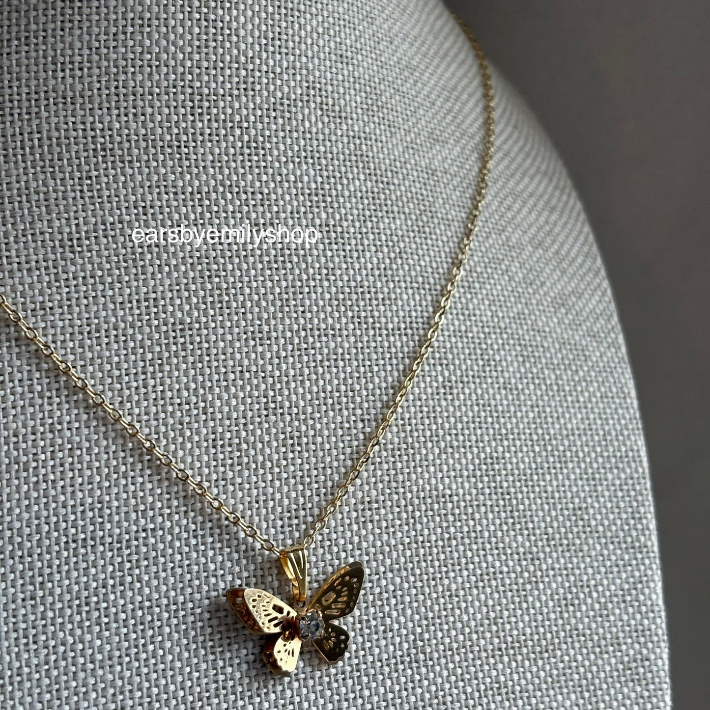 18k gold plated butterfly necklace featuring diamanté design