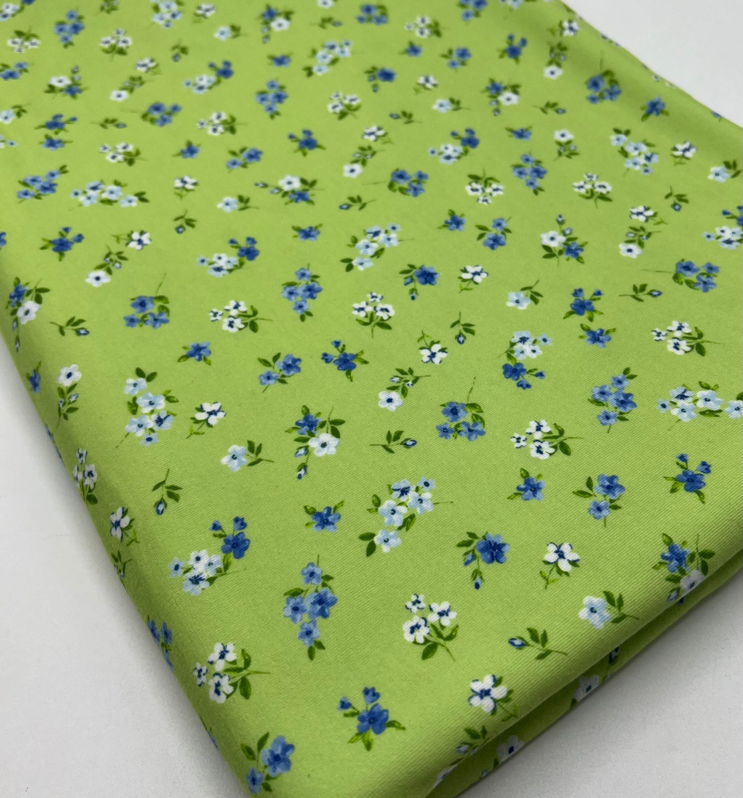 Bright Green Ditsy Floral Print Spun Poly Stretch Fabric