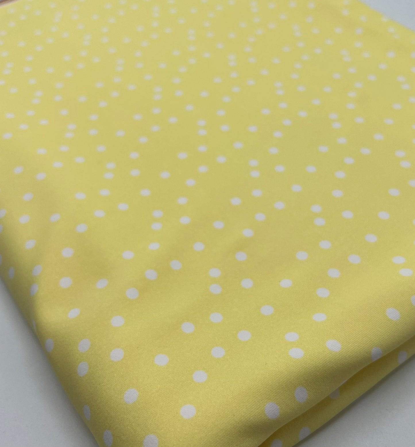 Lemon Yellow Polka Stretch Jersey 220GSM 4 Way Stretch Fabric