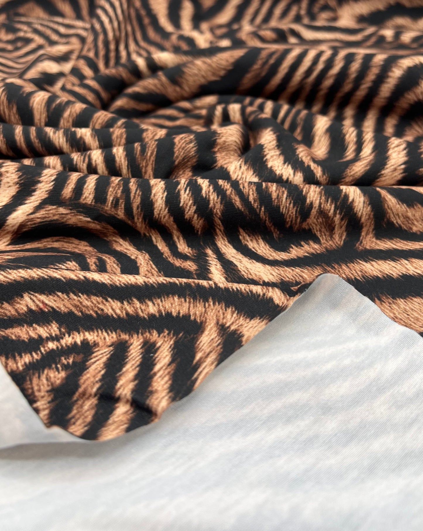 Black Beige Animal Print Spun Poly Stretch Fabric