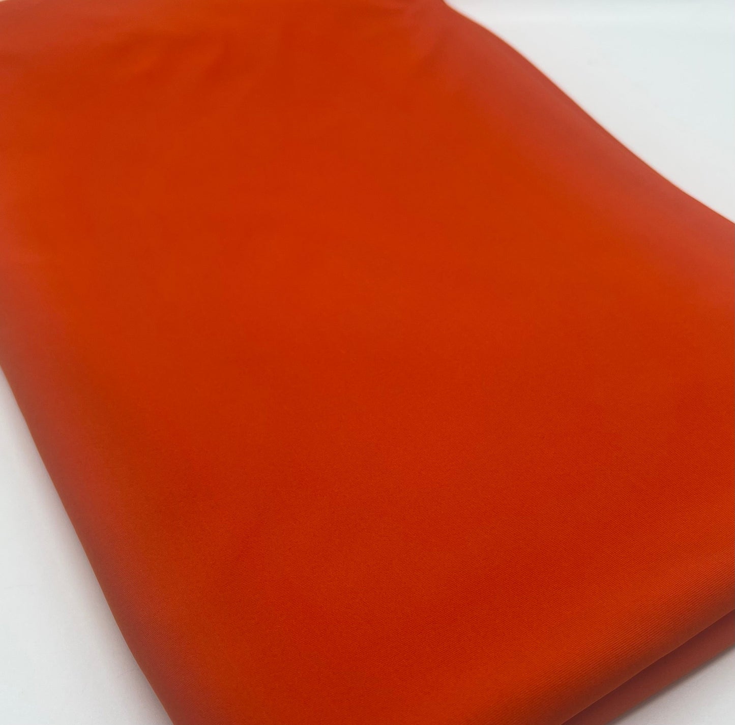 Orange Stretch Jersey 220GSM 4 Way Stretch Fabric
