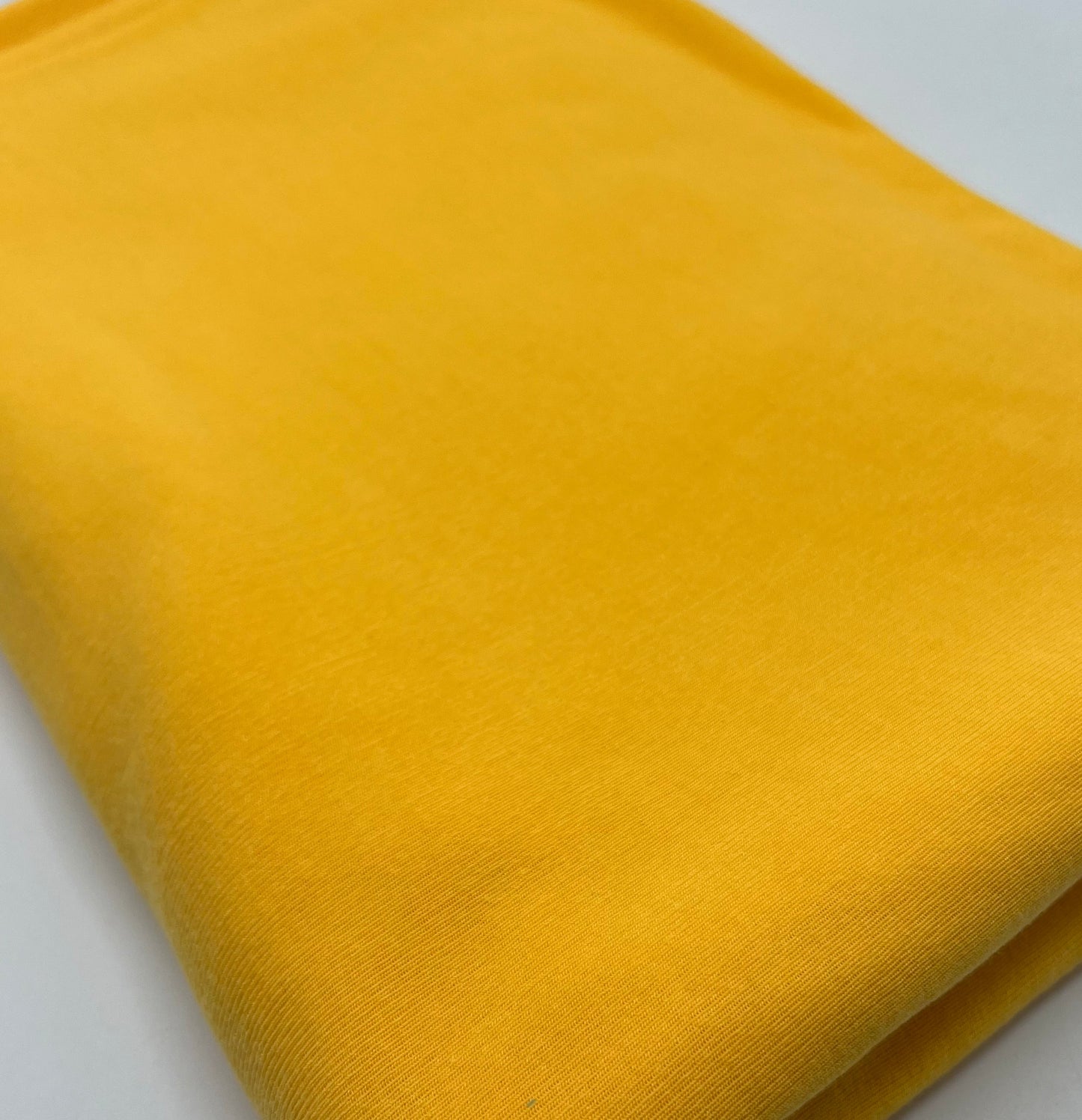 Yellow Lightweight Melange Knit Stretch Fabric