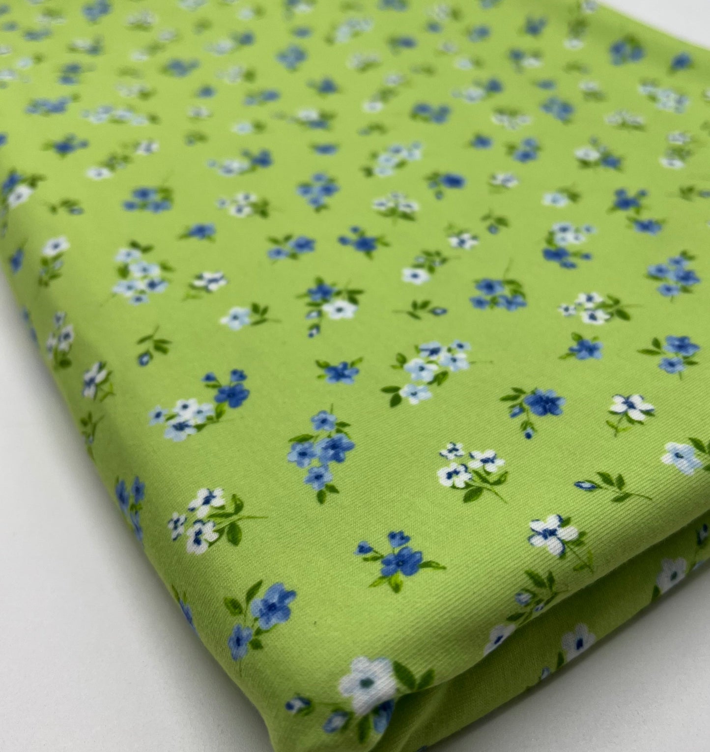 Bright Green Ditsy Floral Print Spun Poly Stretch Fabric