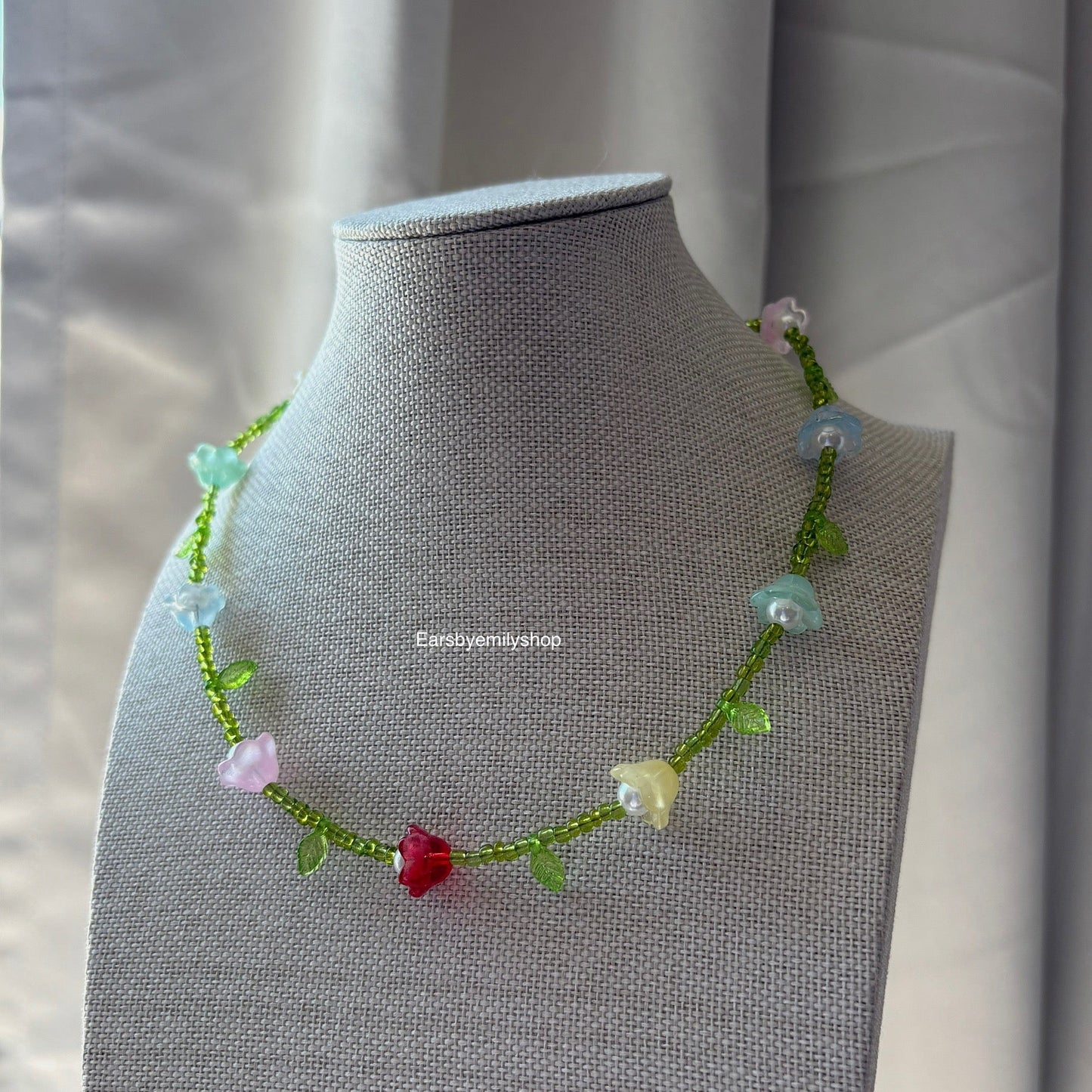 Cool green handmade beaded floral rainbow necklace