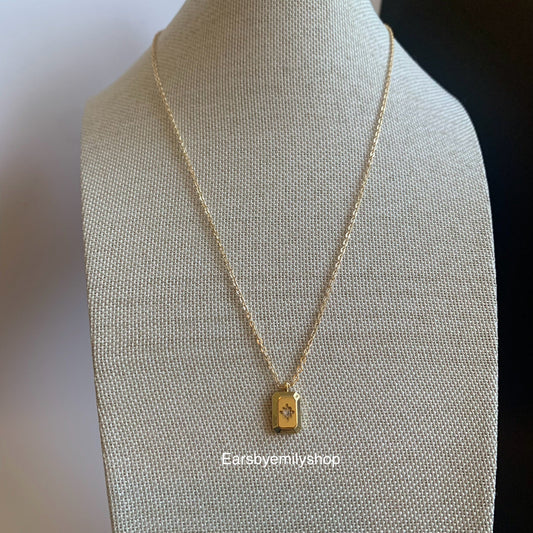Gold plated rectangle pendant with white crystal diamanté necklace