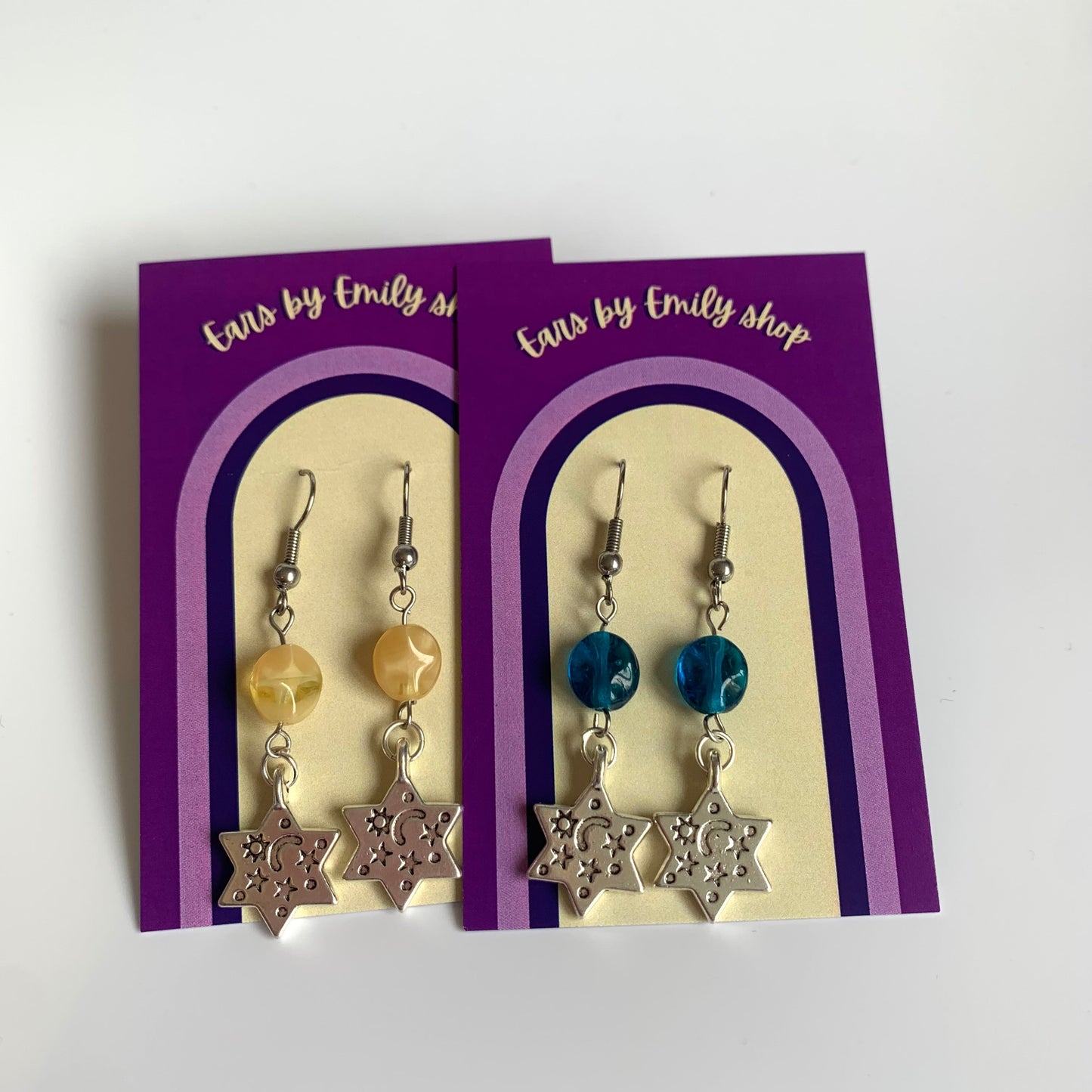 Cool silver star with yellow or blue bead statement dangle hypoallergenic earrings